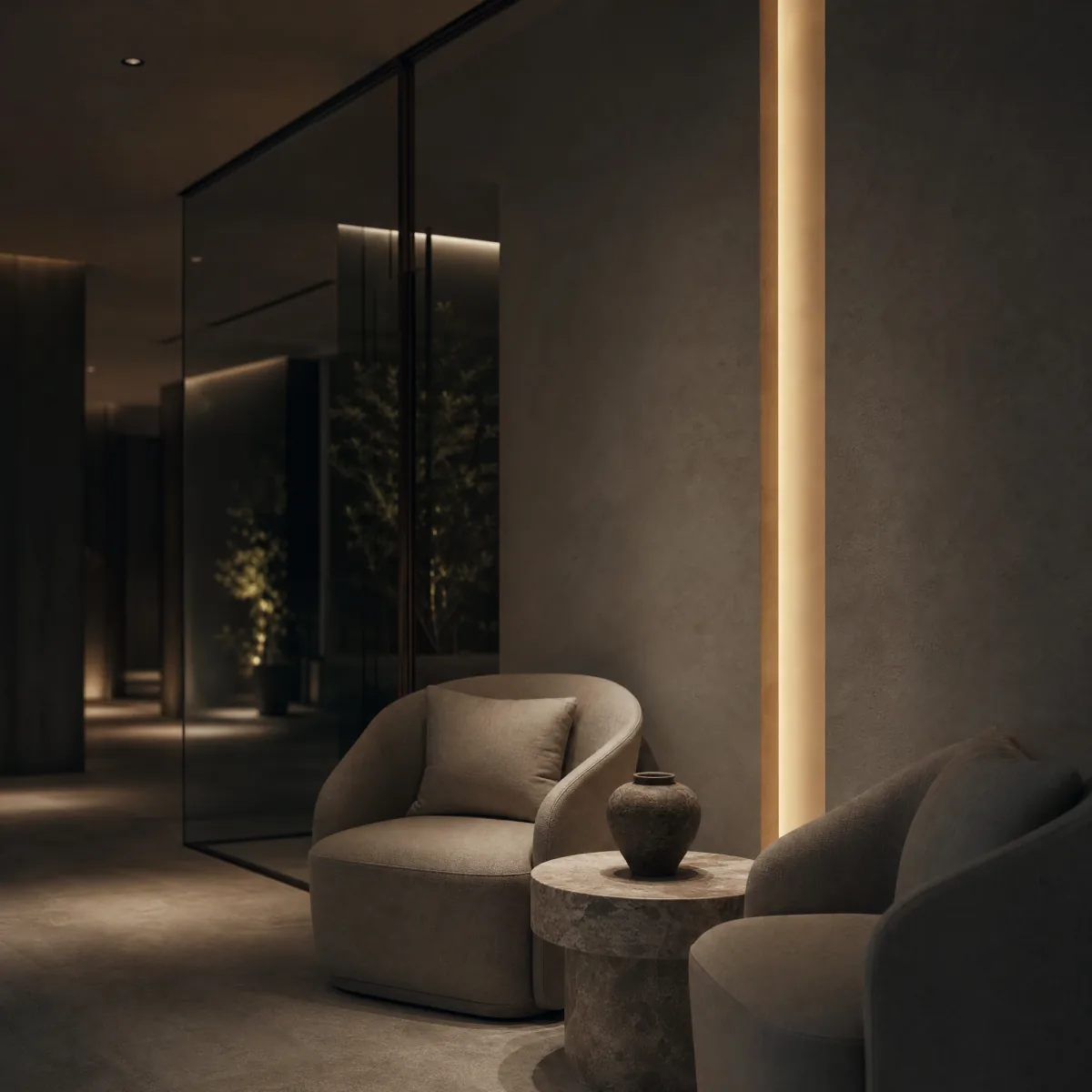 The empty reception corner of a med spa at night, two linen chairs and a warm light slot in a plaster wall